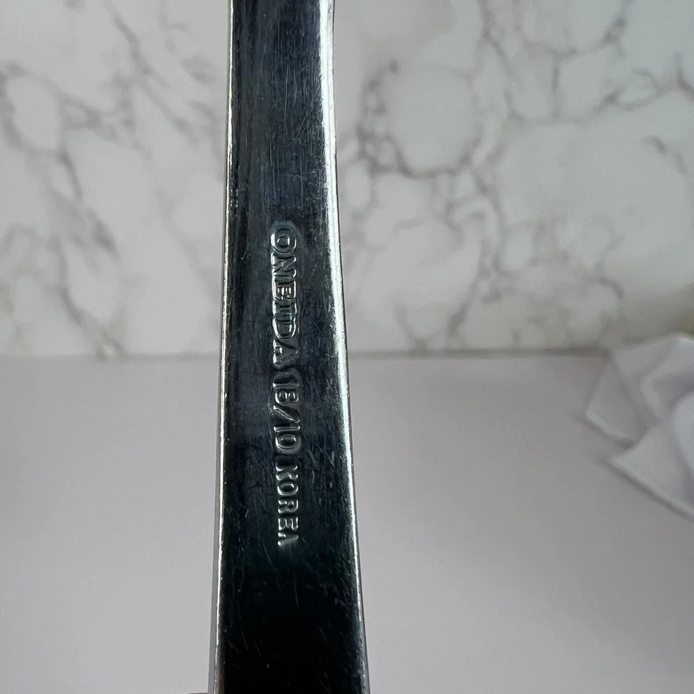 Oneida Apollo 18/10 Stainless Steel Pierced Circles Glossy Dinner Spoon Flatware